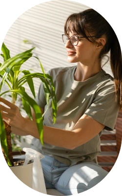 pretty girl holding plants