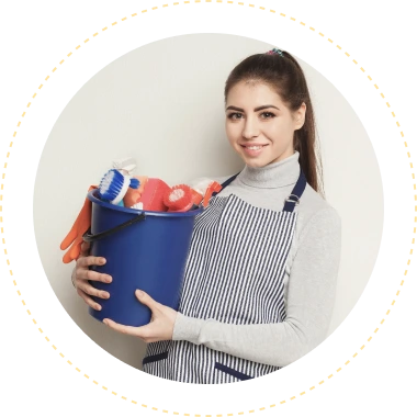 woman holding cleaning items